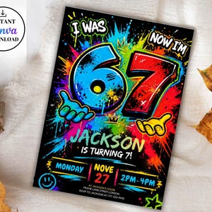 May include: A rectangular birthday invitation card with a black background featuring vibrant paint splatter art in blue, red, green, and yellow. The text reads I WAS 67 NOW I'M 7, JACKSON IS TURNING 7, MONDAY NOV 27, 2PM-4PM, and other event details.