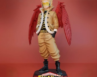 May include: A detailed figurine of the character Hawks from the anime series My Hero Academia. The figure is in a dynamic pose, wearing a tan jacket with a white fur collar, matching pants, and black boots. The figure has large red wings and yellow goggles.