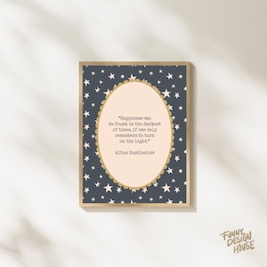 May include: A framed print with a navy blue background covered in white stars. The print features a light peach oval with a gold scalloped border containing a quote by Albus Dumbledore. The words "FUNNY DESIGN HOUSE" are in the bottom right corner.