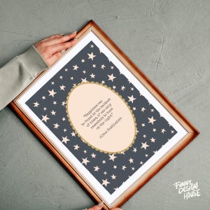 May include: A framed print featuring a quote by Albus Dumbledore, "Happiness can be found in the darkest of times, if one only remembers to turn on the light." The background is dark blue with white stars, and the quote is in a light peach oval.