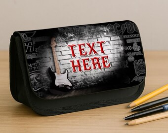 May include: Black pencil case with a rock and roll theme. The design features a black electric guitar, a brick wall background, and the words "TEXT HERE" in red. The case is rectangular and has a black zip.