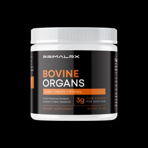 May include: A white plastic supplement container with a black label. The label features the text "PRIMAL RX" at the top, with "BOVINE ORGANS" in large orange letters. Below, it reads "Liver + Heart + Kidney" and "3g Pure Powder Per Serving". The net weight is 3.2 oz.