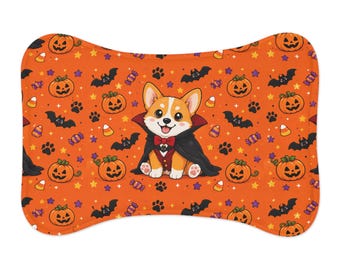 Corgi Vampire Holding Pumpkin Pet Feeding Mat | Halloween Dog Placemat