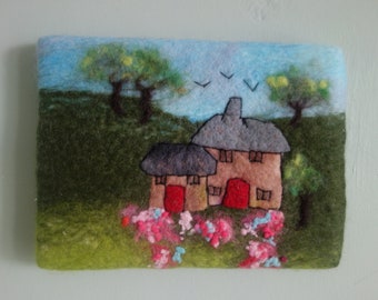 Textile wall hanging a felted picture ,Original felt art , of cottages in a landscape.An attractive small wool painting.