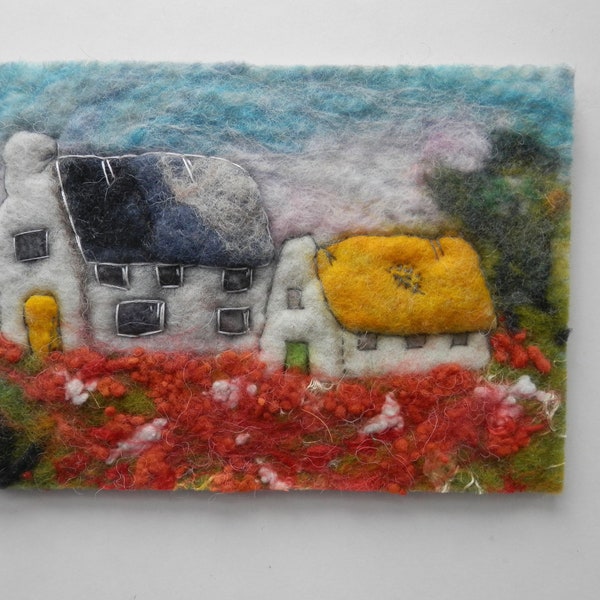 Textile wall decor,a felted picture of  country cottages in a colourful landscape