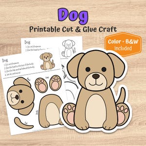 May include: A printable cut and glue craft featuring a cartoon dog. The image includes a large, tan dog illustration with black eyes and a brown nose, along with cut-out pieces and instructions. The text "Dog" and "Printable Cut & Glue Craft" are visible.
