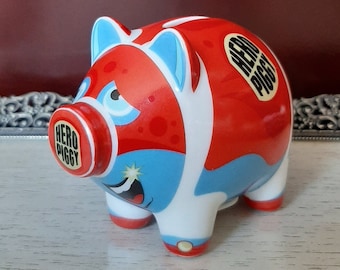 Ritzenhoff Porcelain Pig. Coin Bank. Designed by J.H. Bjorlin for Sieger Design. Hero Piggy. 3 Inches Tall. Like New.