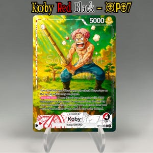 May include: A trading card featuring Koby from the Navy/SWORD series. The card depicts a character with pink hair wielding a bamboo staff. The card has a 5000 strike power rating and includes game text. The card is displayed on a clear stand.