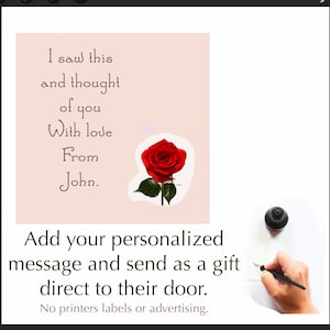 May include: A light pink card with a handwritten message that reads "I saw this and thought of you With love From John." A red rose is on the card. The text "Add your personalized message and send as a gift direct to their door. No printers labels or advertising." is below the card.