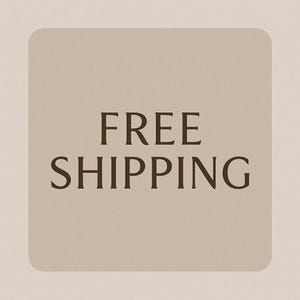May include: A square, beige graphic with rounded corners displays the words "FREE SHIPPING" in a dark brown, bold font. The text is centered on the graphic, which is set against a lighter beige background.