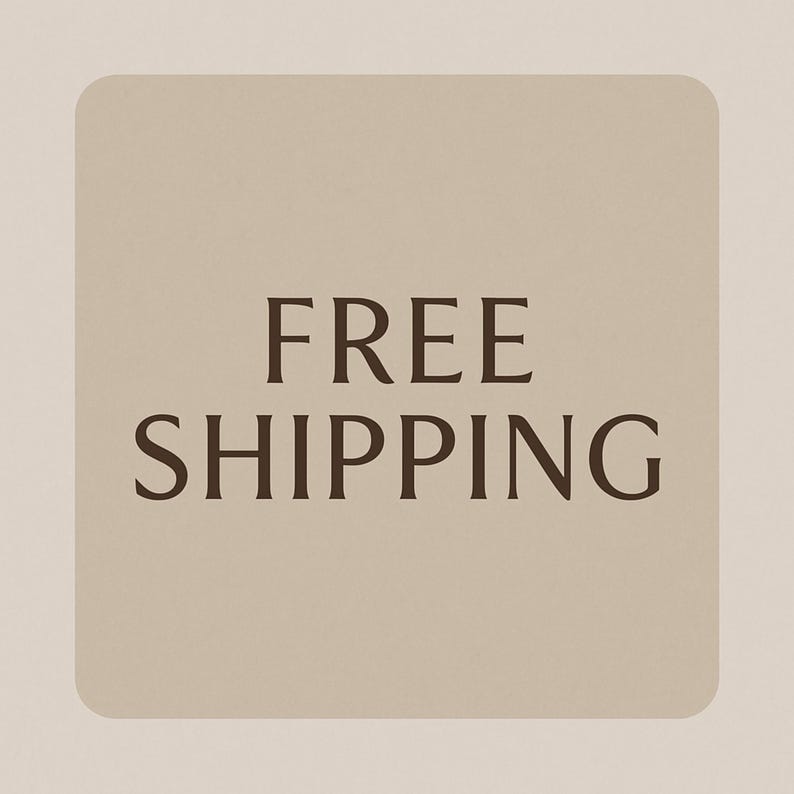 May include: A square, beige graphic with rounded corners features the words "FREE SHIPPING" in a dark brown, serif font. The text is centered on the graphic, which is set against a lighter beige background.