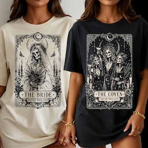 May include: A cream t-shirt featuring a black graphic of a skeleton bride with a bouquet and the text THE BRIDE BRITTA'S BACH 2026, and a black t-shirt featuring a black graphic of three skeleton figures and the text THE COVEN BRITTA'S BACH 2026.