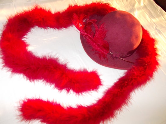 Burgandy hat with feather and matching boa