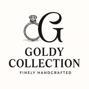 May include: A black and white logo featuring a stylized line drawing of a diamond ring positioned to the left of a large capital letter G. Below the graphic, the text reads GOLDY COLLECTION in a bold serif font, followed by FINELY HANDCRAFTED.