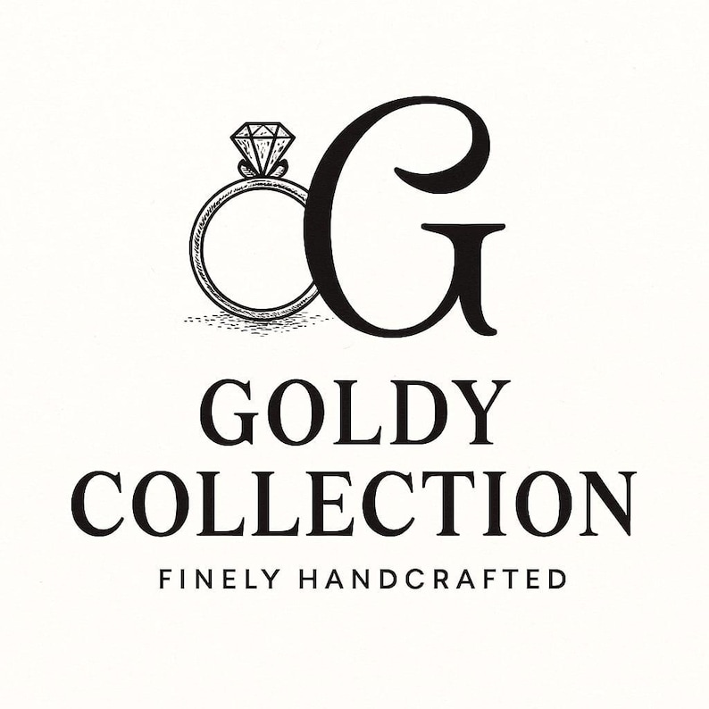 May include: A black and white logo featuring a stylized line drawing of a diamond ring positioned to the left of a large capital letter G. Below the graphic, the text reads GOLDY COLLECTION in a bold serif font, followed by FINELY HANDCRAFTED.