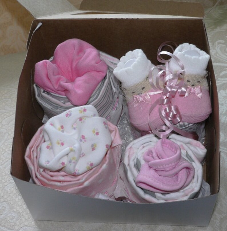 Set of four receiving blanket cupcakes