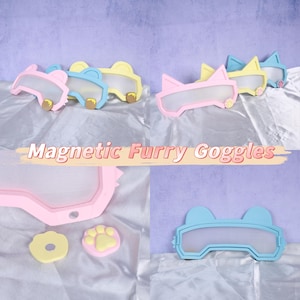 Op de afbeelding: Een verzameling kleurrijke, magnetische harige brillen in roze, blauw en geel. De brillen hebben dierenorenontwerpen en worden geleverd met bijpassende poot- en donutvormige accessoires. De tekst "Magnetic Furry Goggles" wordt weergegeven.
