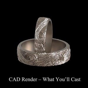 May include: Two silver rings with a textured, swirling pattern. The rings are displayed against a black background. The text "CAD Render - What You'll Cast" is at the bottom of the image.