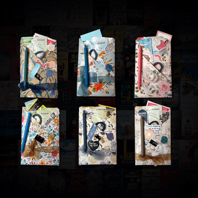 May include: Six decorative book wraps with floral and patterned designs. Each wrap includes a pen, stickers, and a ribbon. The wraps are decorated with stickers and small cards, creating a unique and personalized look.
