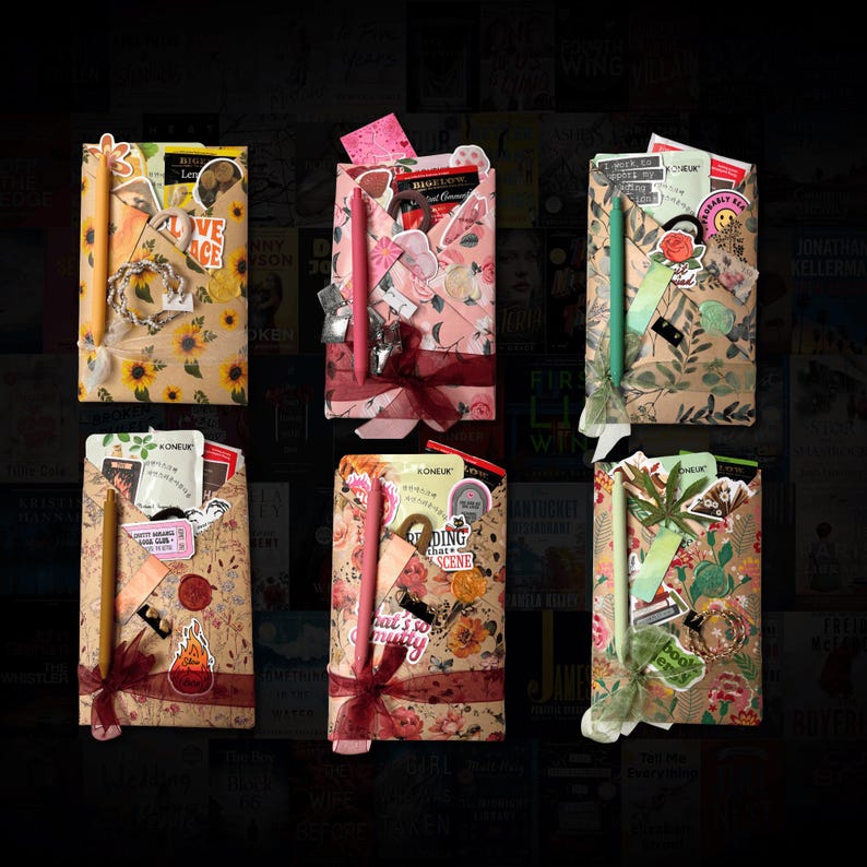May include: Six decorative gift boxes, each wrapped in patterned paper and decorated with stickers, ribbons, and pencils. The boxes feature floral, sunflower, and botanical designs. Some boxes have the text "LOVE" and "DING THAT SCENE".