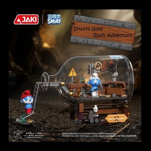 May include: A Smurfs Gold Rush Adventure playset. The set features Smurf figurines, mining equipment, and a treasure chest inside a clear bottle-shaped container. The set includes a wooden sign that reads "Smurfs Gold Rush Adventure".