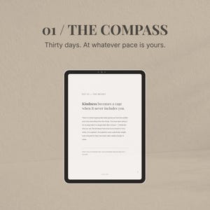 May include: A digital tablet displaying text from "The Compass" with the title "01 / THE COMPASS" and the text "Thirty days. At whatever pace is yours." The screen shows the text "Kindness becomes a cage when it never includes you."