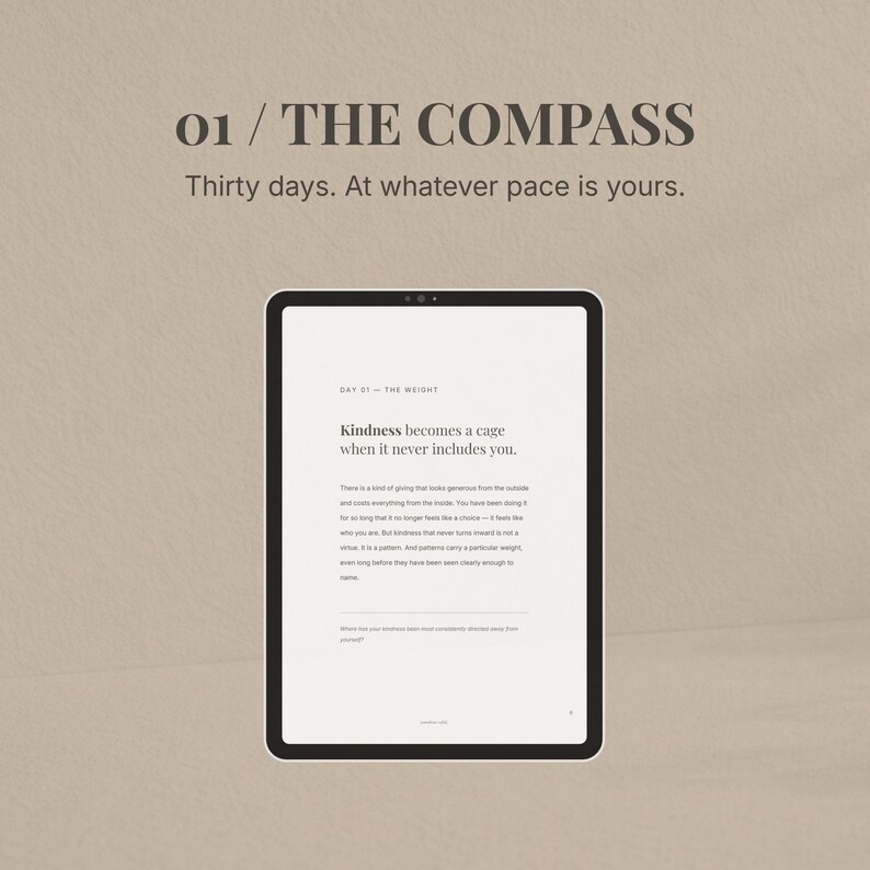 May include: A digital tablet displaying text from "The Compass" with the title "01 / THE COMPASS" and the text "Thirty days. At whatever pace is yours." The screen shows the text "Kindness becomes a cage when it never includes you."