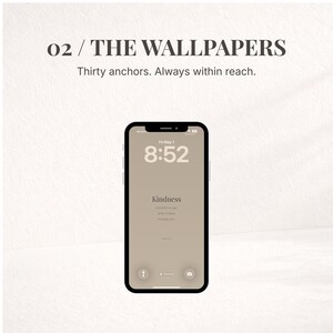 May include: A smartphone with a black frame displays a beige wallpaper with the word "Kindness" and the time 8:52. The text "02 / THE WALLPAPERS" and "Thirty anchors. Always within reach." are at the top.