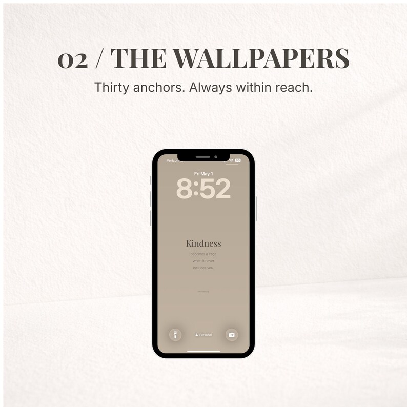 May include: A smartphone with a black frame displays a beige wallpaper with the word "Kindness" and the time 8:52. The text "02 / THE WALLPAPERS" and "Thirty anchors. Always within reach." are at the top.