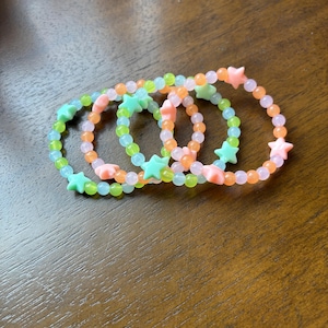 pink or blue beaded bracelet