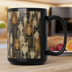 Whimsical Cat Mug: Black Ceramic Coffee Cup, Gift for Cat Lovers