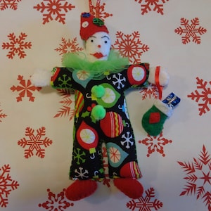 Clown Pierrot di Natale con ornamento di calatura di Pepperland