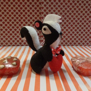 Mr. Romeo Skunk Valentine&#39;s Day Ornament by Pepperland