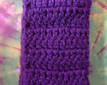 May include: Purple crocheted fabric with a textured pattern.
