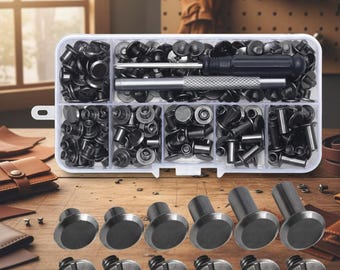 May include: A clear plastic storage box filled with various black metal rivets and fasteners, including a small screwdriver and a metal punch tool. Below the box, six sets of black metal Chicago screws are arranged in two rows on a wooden surface.