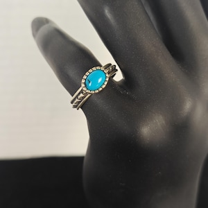 Signed Carolyn Pollack Sterling silver ring with turquoise stone. size 6