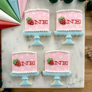 May include: A white ceramic mug with a black handle and the text "But First, Coffee" in a handwritten style. The mug is on a white surface. The mug is 4 inches tall.