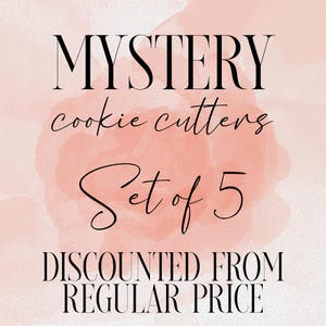 Puede incluir: Imagen con texto: "MYSTERY cookie cutters Set of 5 DISCOUNTED FROM REGULAR PRICE" en negro, con fuentes script y serif. El fondo es un lavado de acuarela en tonos rosa y melocotón.