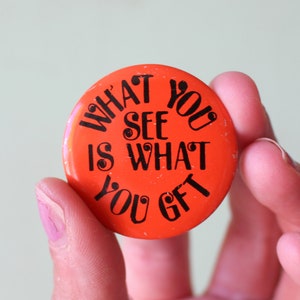 80s Vintage What YOU SEE Is What You GET Button Pin..retro accessories. kitsch. flair. jewelry. 80s accessories. funky. gift. swimming. neon