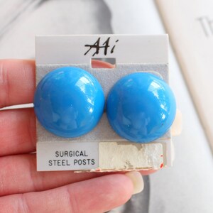 1980s NOS Vintage Teal Blue Round Circle Stud Earrings.....retro. kitsch. new old stock. pierced ears. 80s glam. costume. goth. punk. bright