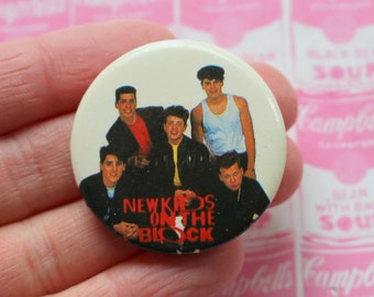 1990s NEW KIDS on the BLOCK Button Pin Back....retro. jordan and jonathan knight. joey. donnie. danny. teens. pop music. band. 90s music.