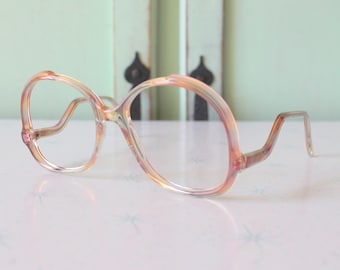 Vintage JACKIE O Glasses......PINK. new old stock. classic. groovy. twiggy. mod. retro glasses. librarian. secretary. woodstock. oversized