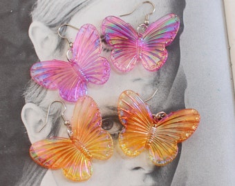 The BUTTERFLY Garden Earrings..orange pink. handmade. daisy. insect. groovy. retro. big flower. classic. floral. daisy. costume jewelry. bug