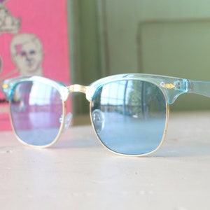 Vintage Blue Retro Mod Deadstock Sunglasses....retro. colorful shades. 90s sunglasses. 90s eyewear. festival. travel. blue lens. blue frames
