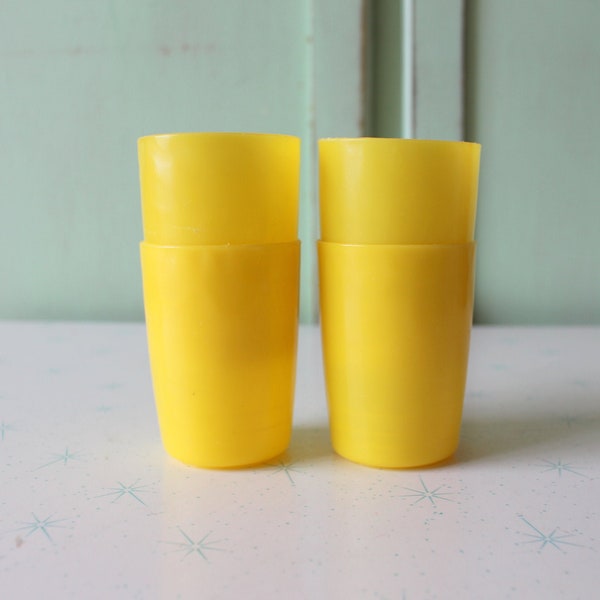 Vintage COLORFUL Cups Set of 4..housewarming. cups. vintage home. set. cups. sunshine. 1970s. picnic. home decor. gift. plastic cups. yellow