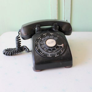 1960s 1970s BLACK TELEPHONE.....retro. diner. rad. 1960s phone. collectible. rare. home. kitsch. desktop telephone. vintage decor. antique