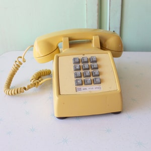1960s MUSTARD Yellow TELEPHONE..retro. diner. rad. 1960s phone. collectible. rare. awesome. home. kitsch. telephone. vintage decor. antique