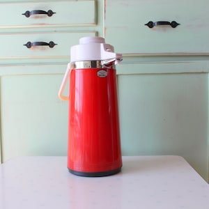 Vintage Red Thermos: Retro Atomic Kitchen Decor