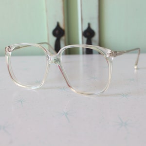 Vintage JACKIE O Glasses..new old stock. classic. groovy. twiggy. mod. retro glasses. librarian. secretary. woodstock. oversized. clear