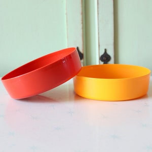 Vintage YELLOW and ORANGE Retro Set of 2....yellow. orange. bright. 1970s. 1960s. kitsch. serving. bowls. stackable. tupperware. made in usa
